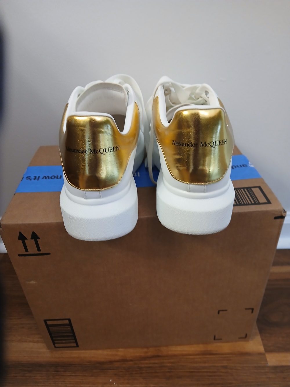 Alexander McQueen White Sneakers with Metallic Gold Heel Tab